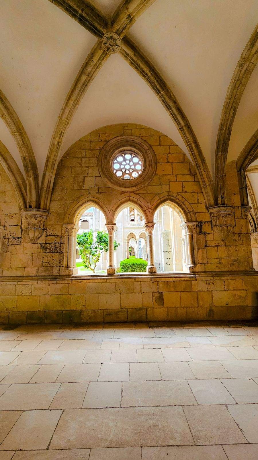 Gothic arches in the Cloister of Silence at Alcobaca Monastery