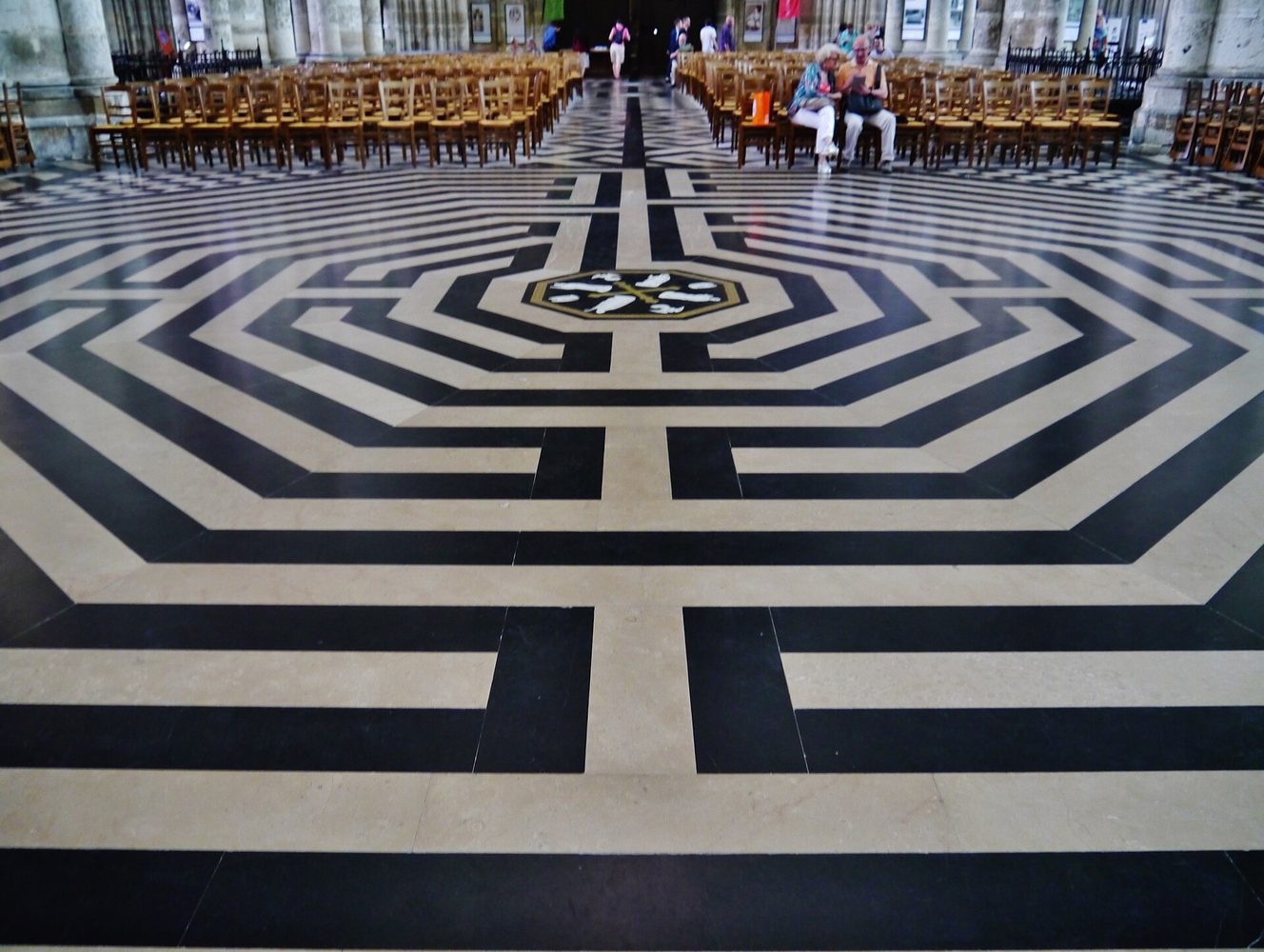The black and white octagonal labyrinth set into the floor of the nave of Amiens Cathedral