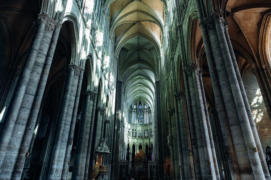 Looking down the immensely tall Gothic nave of Amiens Cathedral towards the choir