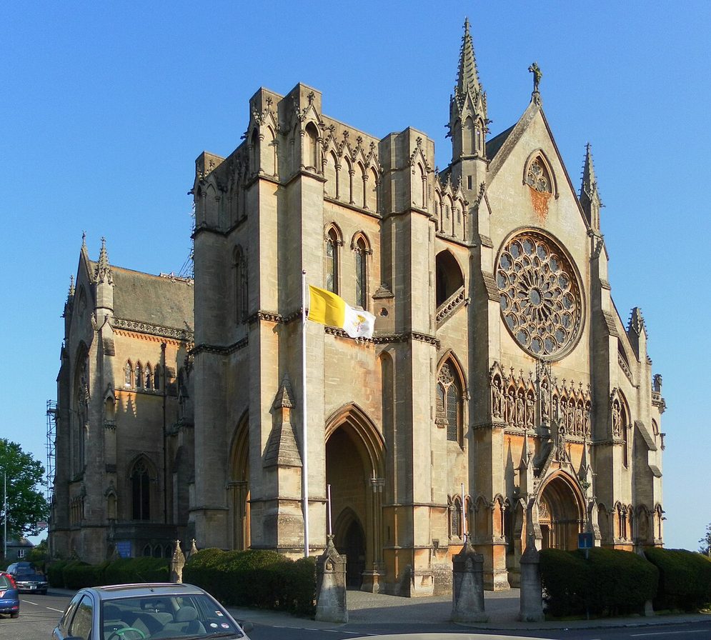 Arundel Cathedral, a tall French Gothic church of pale stone with a great rose window in its west front
