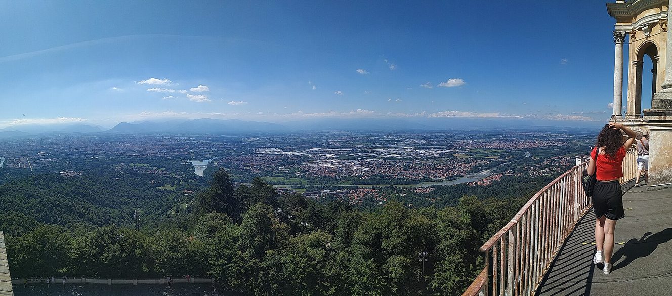 Panoramic view from Superga over the wooded hills, the city of Turin and the plain towards the Alps