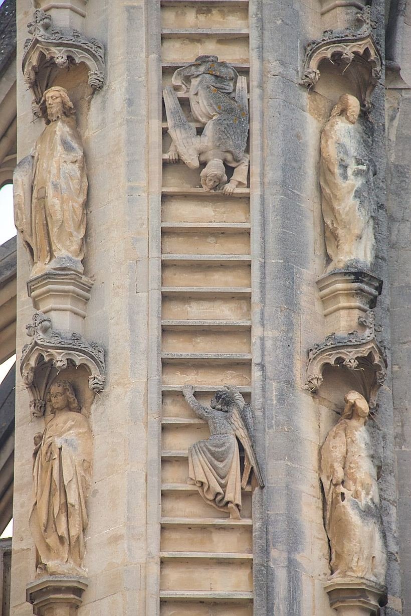 Detail of angels climbing a carved stone ladder on Bath Abbey's west front