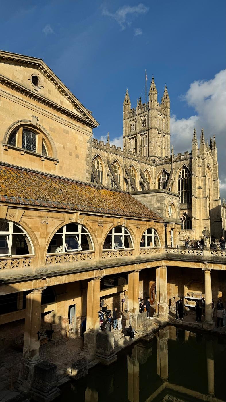 Bath Abbey rising above the Roman Baths in the centre of Bath
