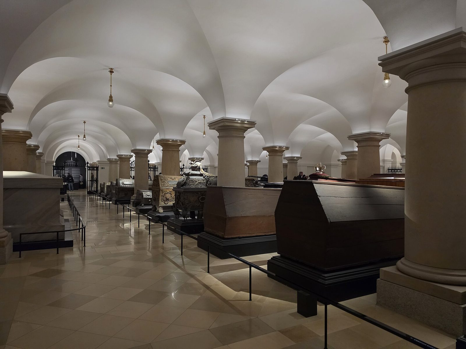 Rows of coffins and sarcophagi in the Hohenzollern crypt beneath Berlin Cathedral