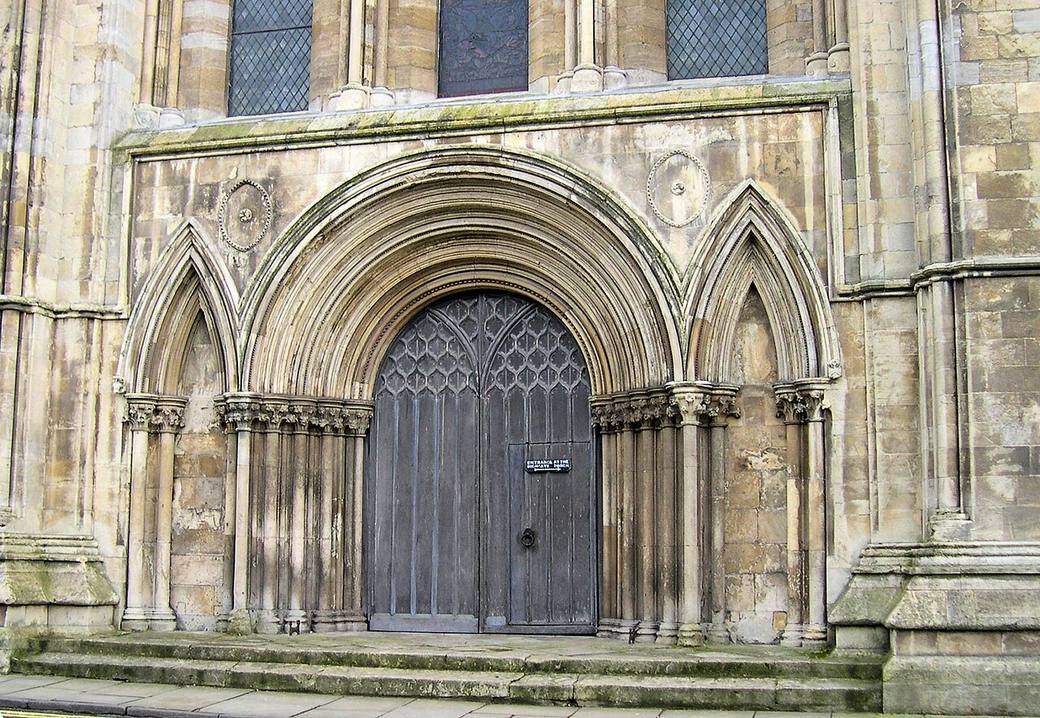The north transept front of Beverley Minster with its carved Early English doorway