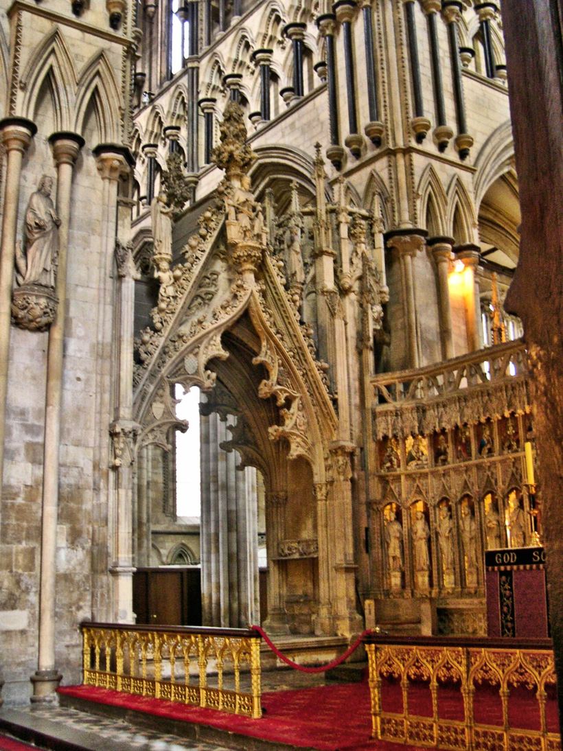 The richly carved stone canopy of the Percy Tomb in Beverley Minster with its tall nodding ogee arch