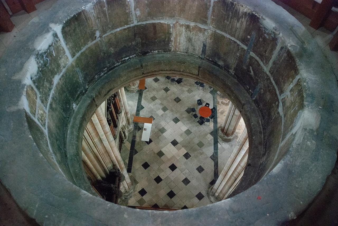 Looking down into the nave of Beverley Minster through a hatch in the roof vault