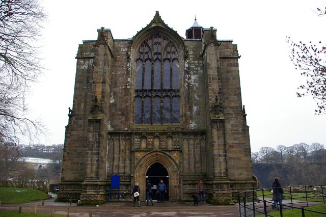The unfinished west tower of Bolton Priory, begun in 1520, in front of the church