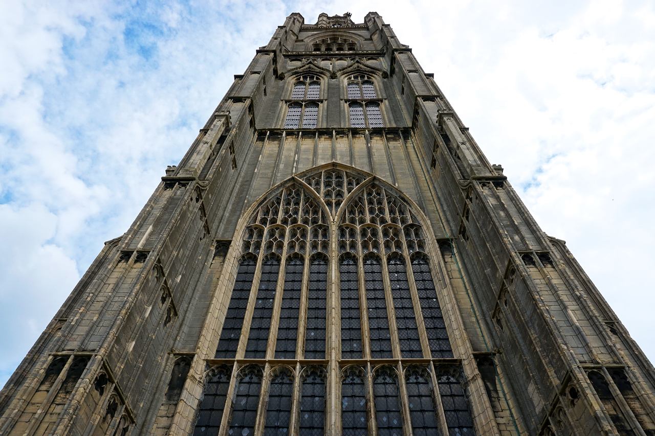 Looking up at the great west window and the base of the tower of St Botolph's