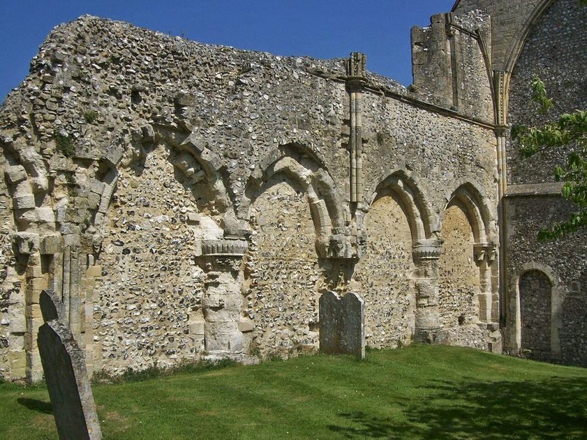 The ruined wall and arches of the demolished nave at the west end of Boxgrove Priory