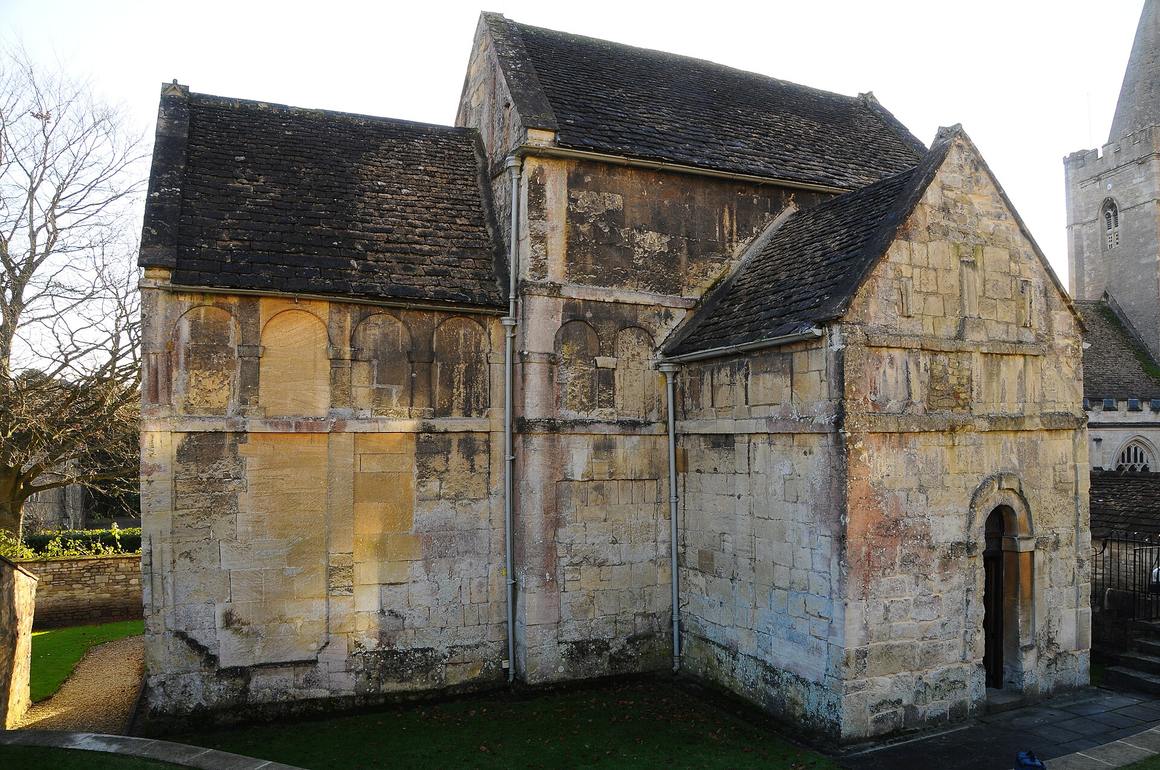 The north side of the Saxon church, showing the nave, porch and chancel and the blind arcading on the walls