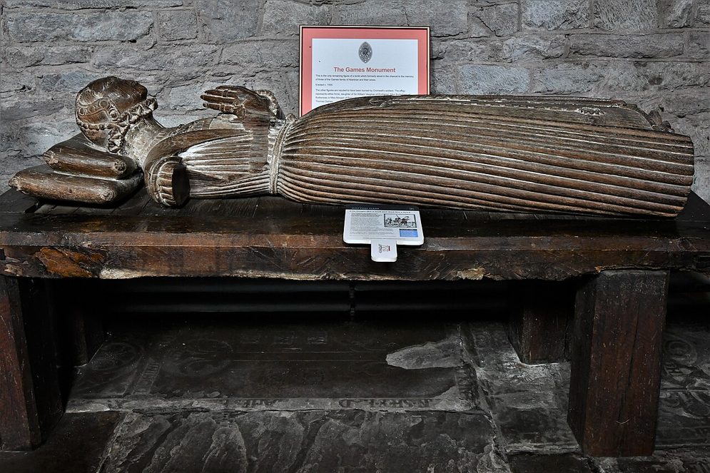 The Games monument in Brecon Cathedral, a carved wooden effigy of a woman lying on a tomb chest