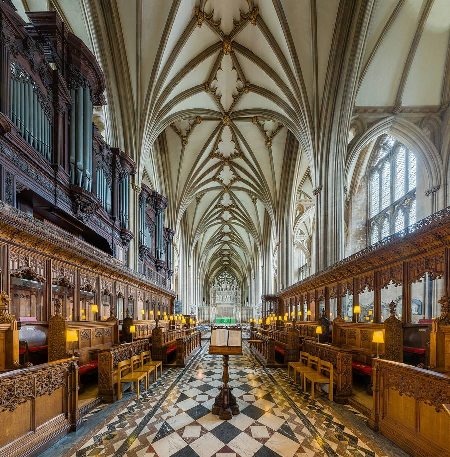 The choir of Bristol Cathedral with carved stalls and the high vault