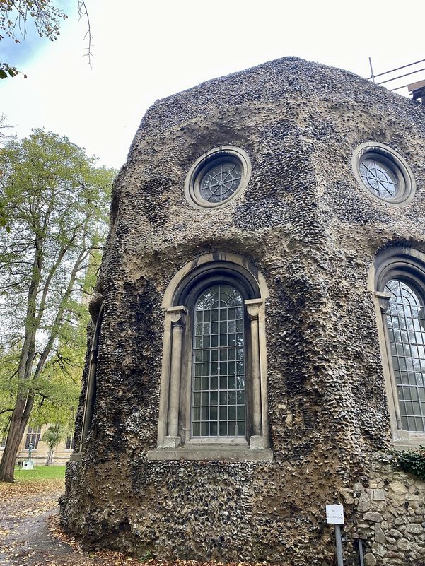 Samson's Tower, an octagonal flint tower with windows, part of the ruined west front of Bury St Edmunds Abbey