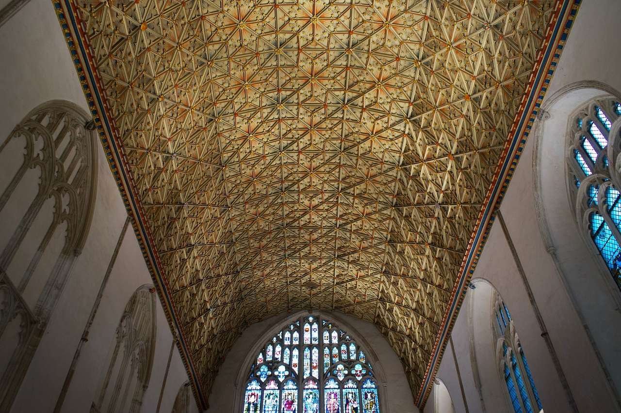 The Chapter House of Canterbury Cathedral, its ornate ceiling and windows