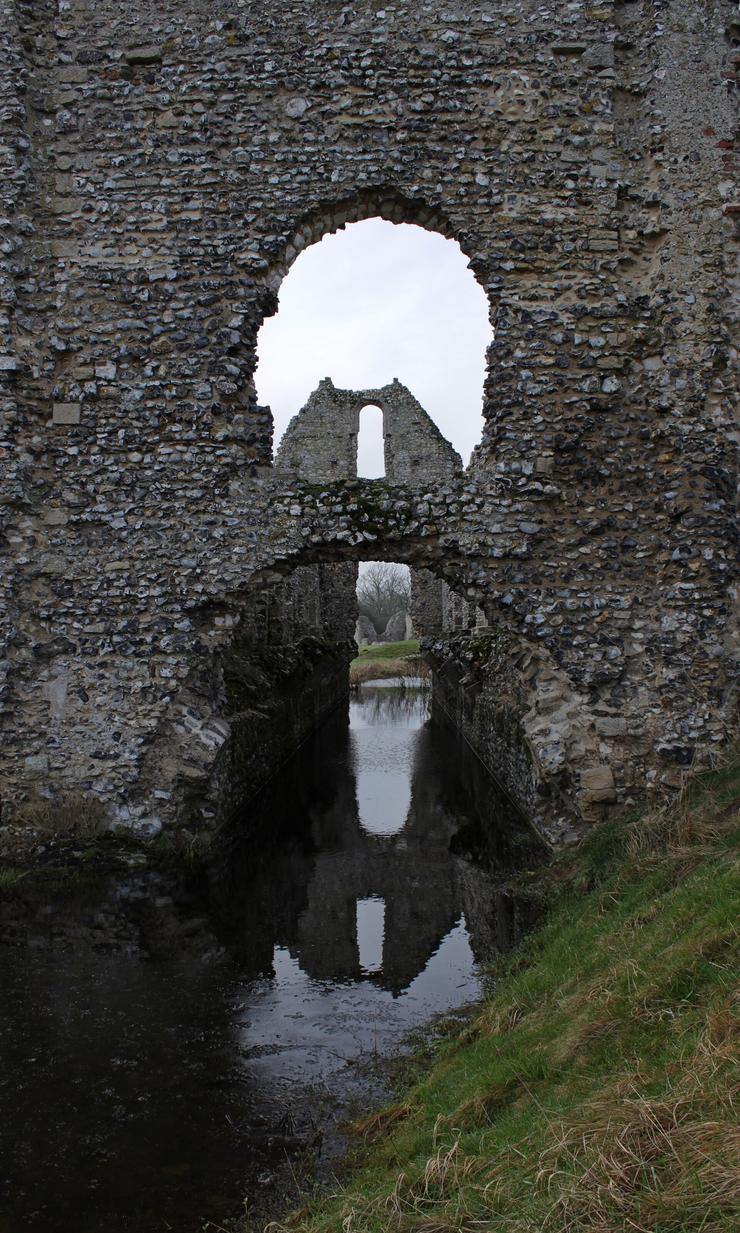 The ruined two-storey latrine block of Castle Acre Priory