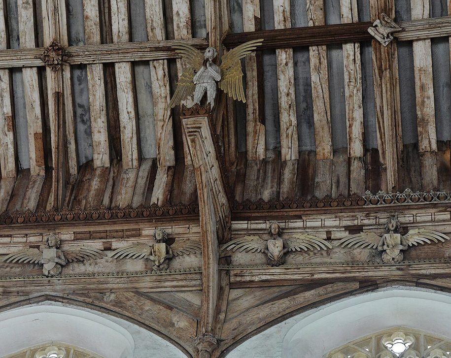 The hammerbeam roof of Cawston church, with carved angels with outspread wings on the ends of the beams