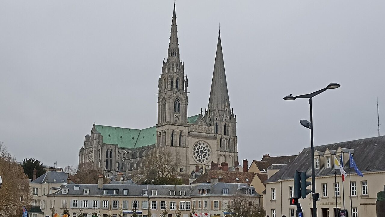 Chartres Cathedral with its two spires rising above the roofs of the town