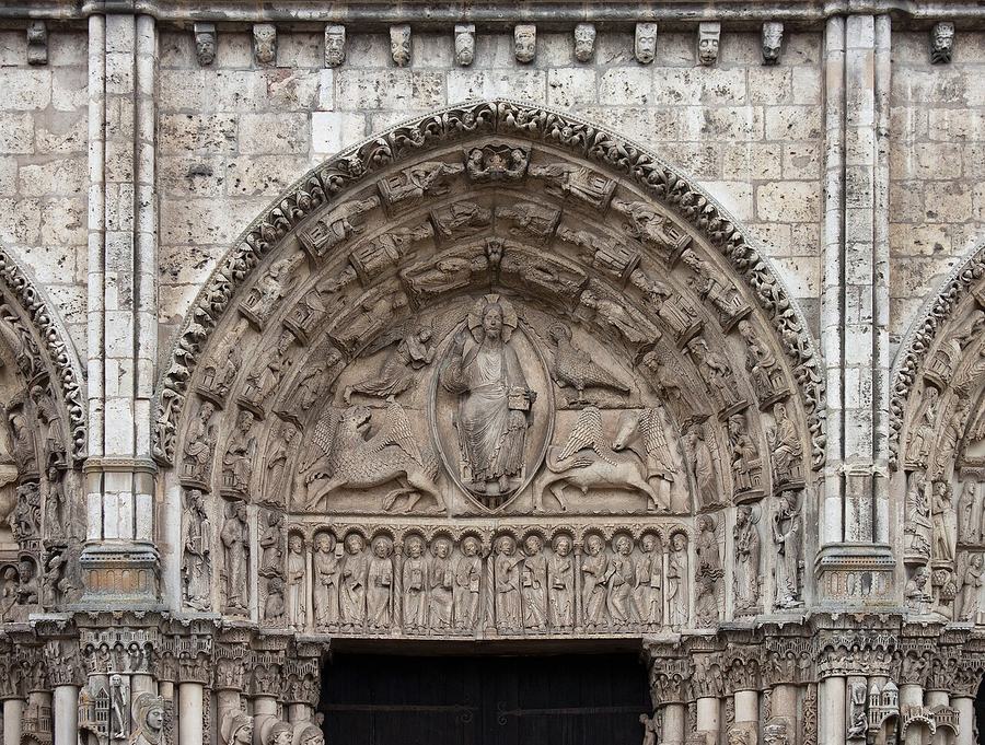 The central tympanum of the Royal Portal at Chartres with Christ in majesty and the symbols of the evangelists