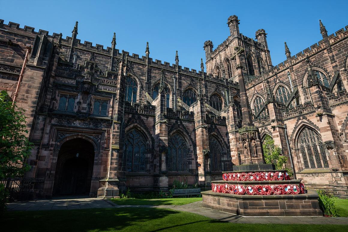 The red sandstone exterior of Chester Cathedral with its central tower