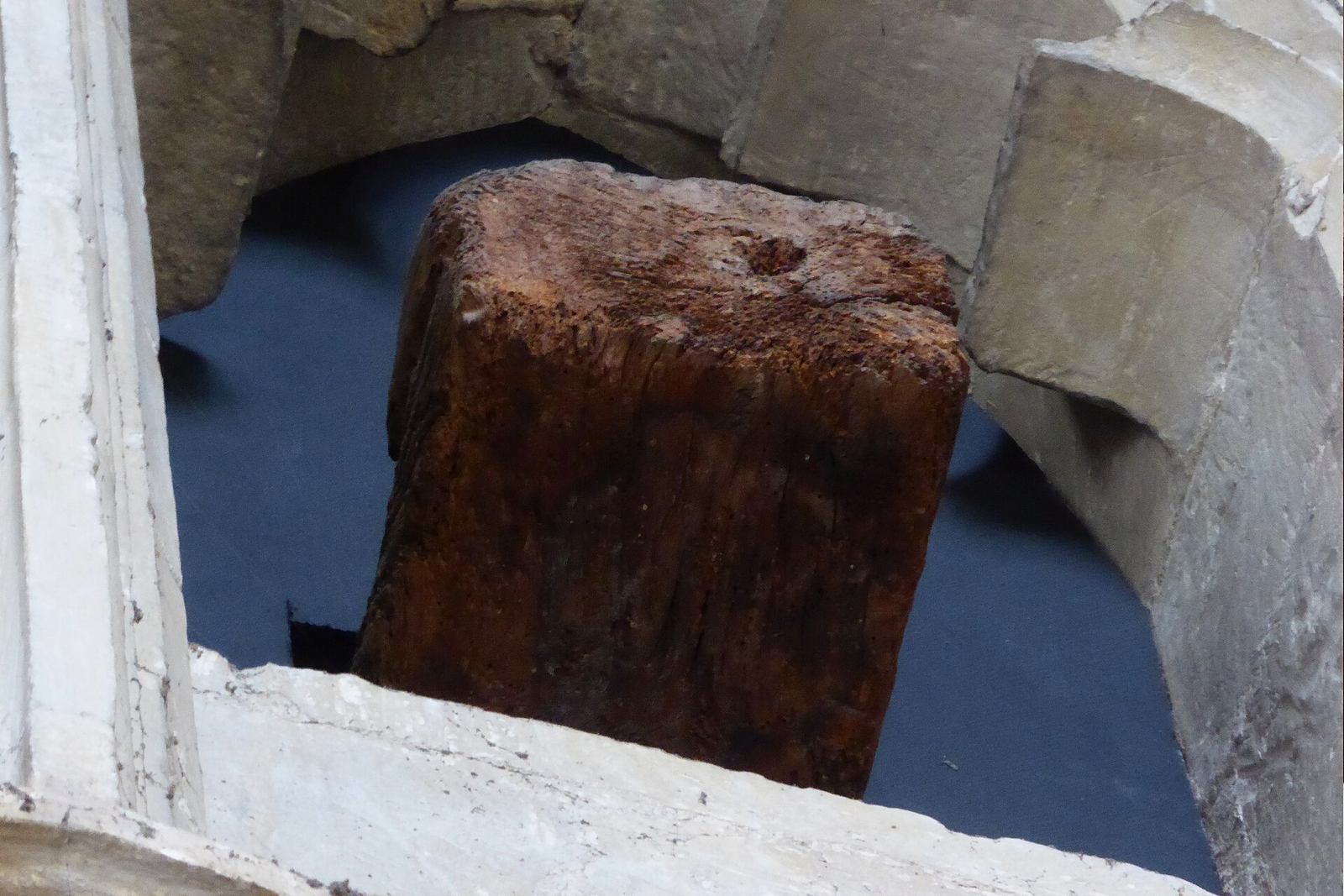 The old wooden beam known as the Miraculous Beam in the roof of Christchurch Priory