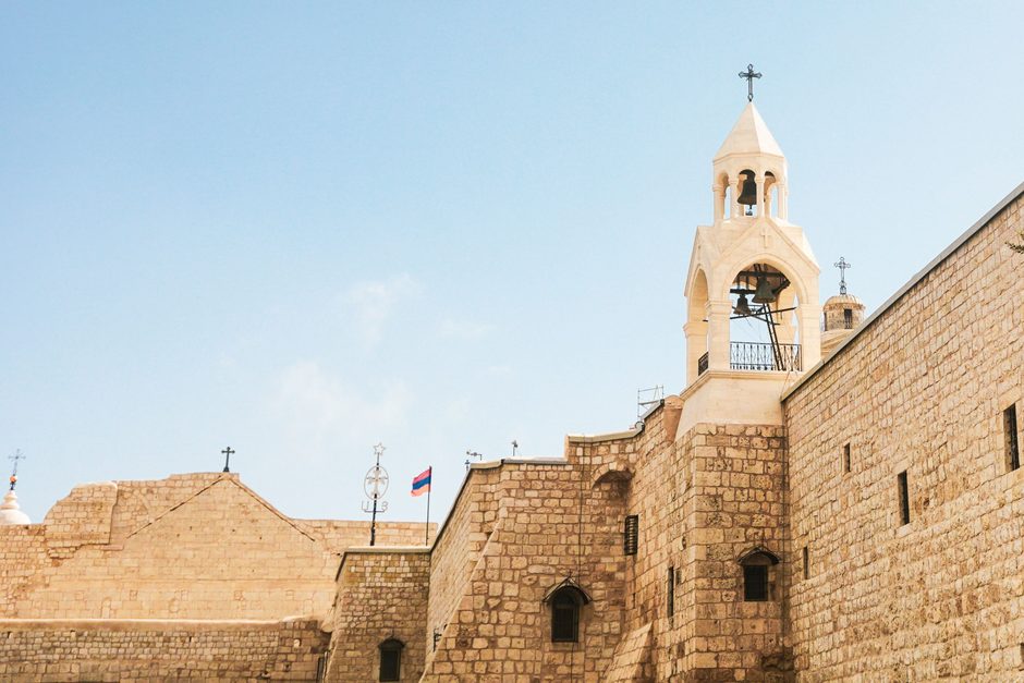 The stone walls and bell tower of the Church of the Nativity in Bethlehem