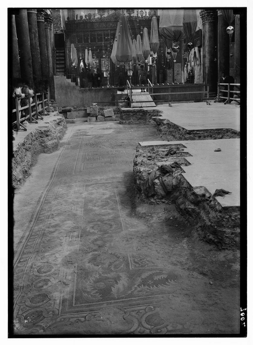 An old black and white photograph of the early mosaic floor exposed below the nave of the Church of the Nativity