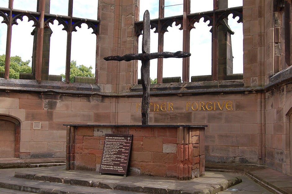 The charred cross and altar in the ruins of old Coventry Cathedral
