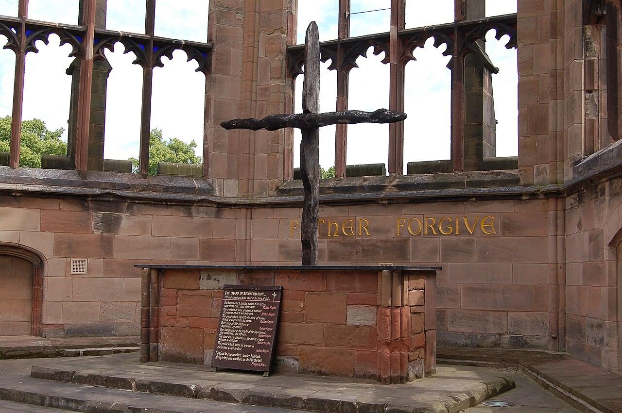 The Altar of Reconciliation in the ruins of old Coventry Cathedral with its charred cross