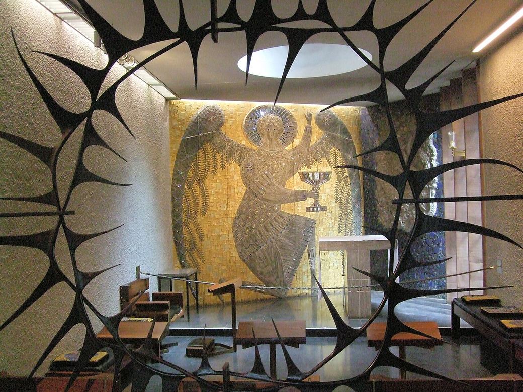 The Chapel of Christ in Gethsemane at Coventry Cathedral seen through its crown-of-thorns screen