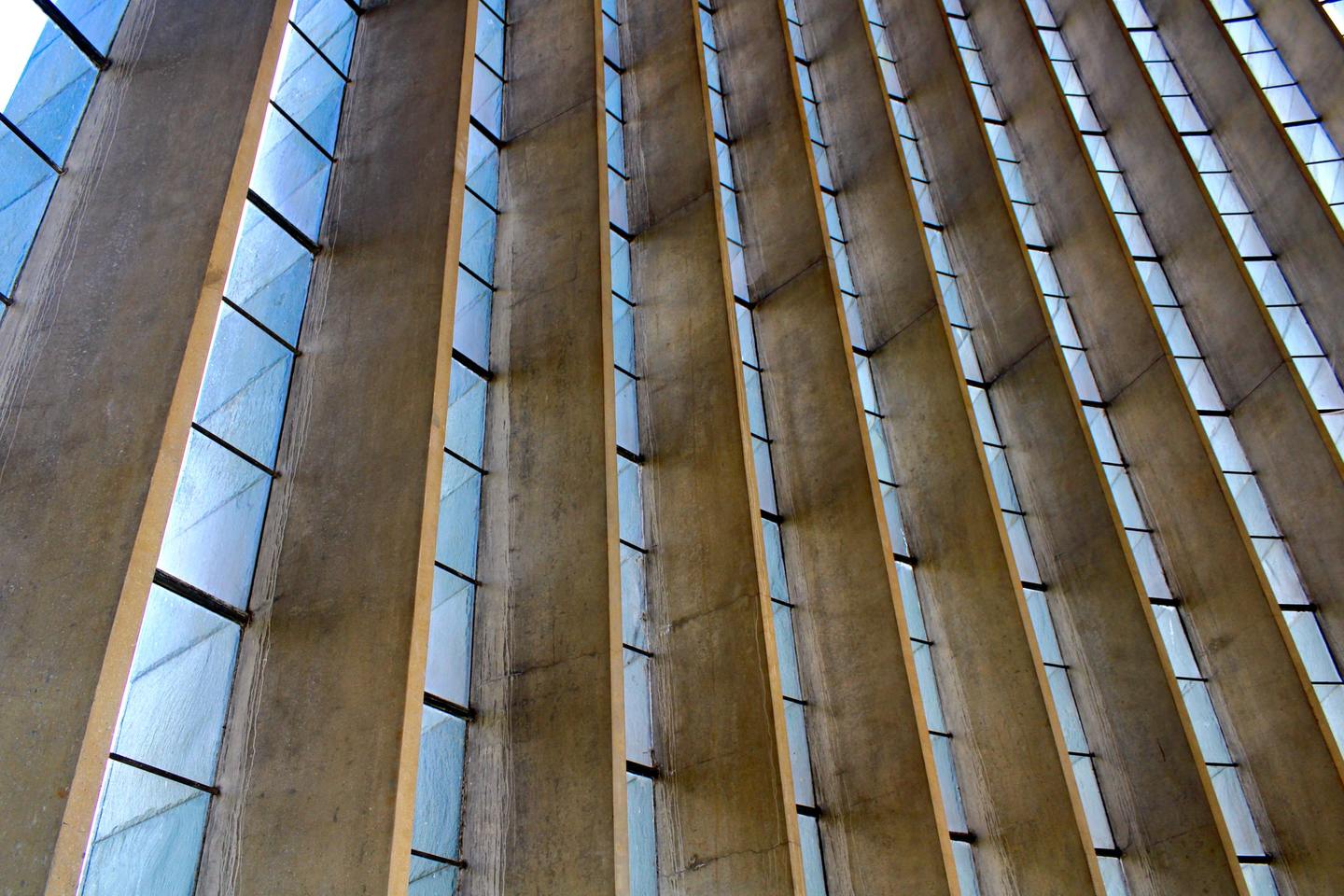 The angled stained-glass nave windows of Coventry Cathedral