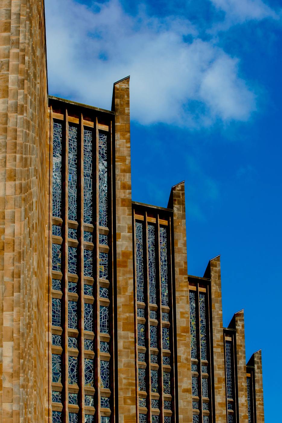 The exterior of the new Coventry Cathedral with its tall slit windows
