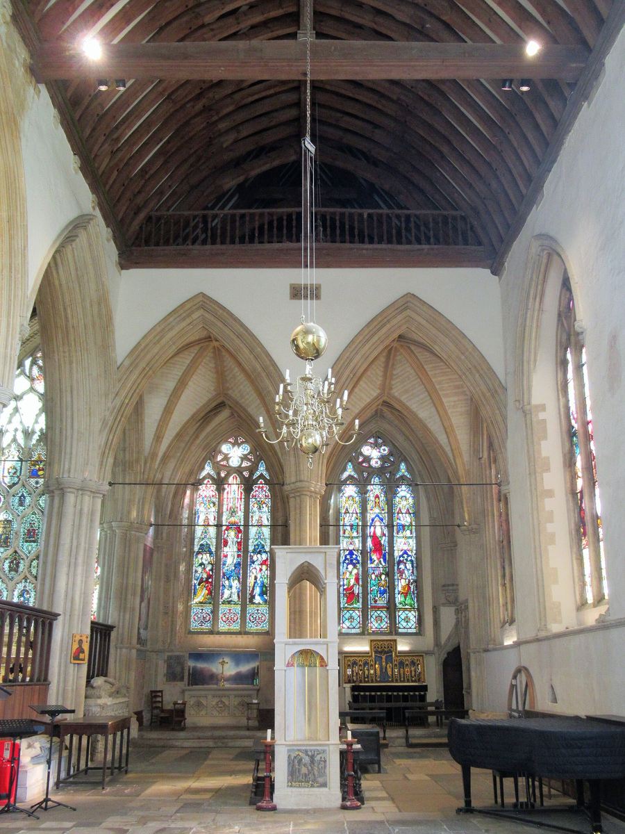 A pale stone canopied shrine in the interior of Dorchester Abbey