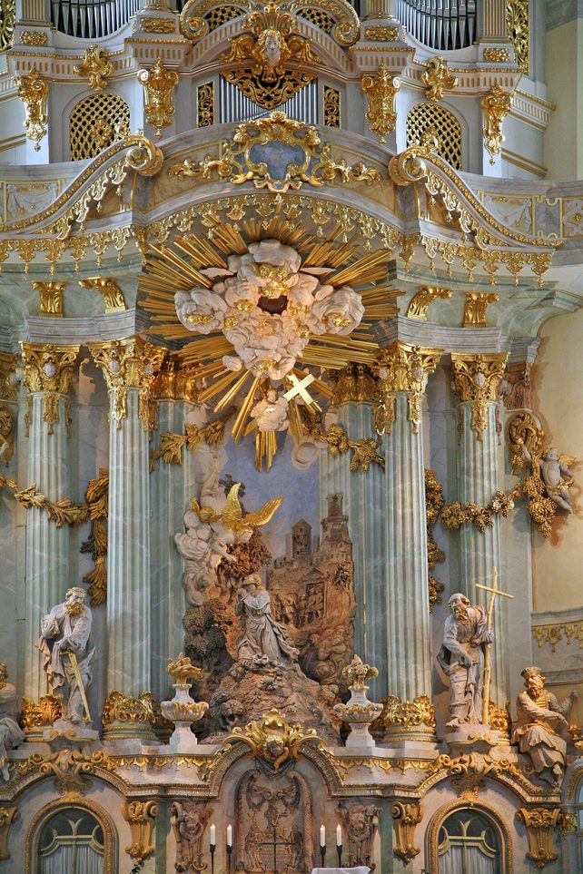 The gilded baroque altar of the Frauenkirche in Dresden, with the organ above it