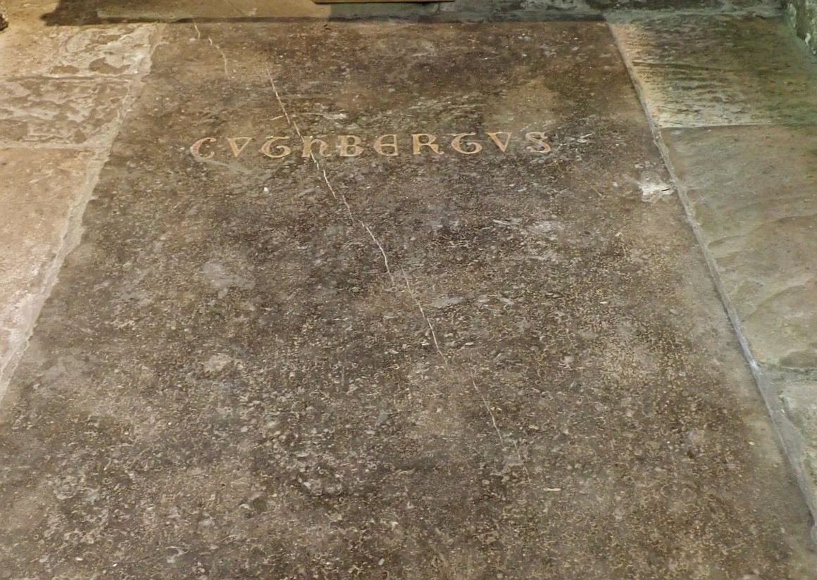 The floor slab marking the grave of St Cuthbert behind the high altar at Durham Cathedral