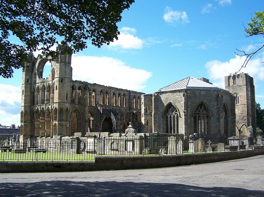 The octagonal chapter house of Elgin Cathedral seen from outside, with its tall traceried windows