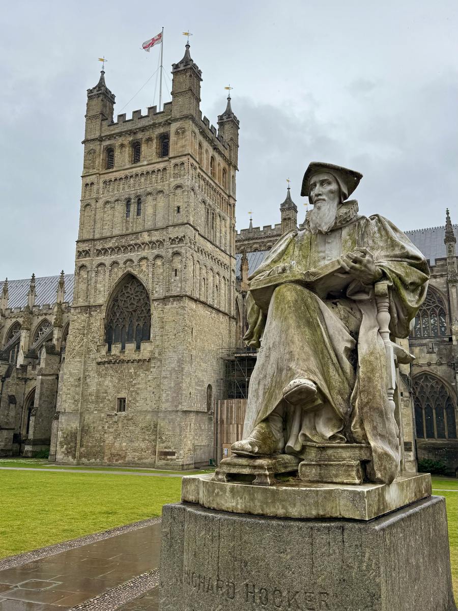 The statue of Richard Hooker on Cathedral Green in front of Exeter Cathedral