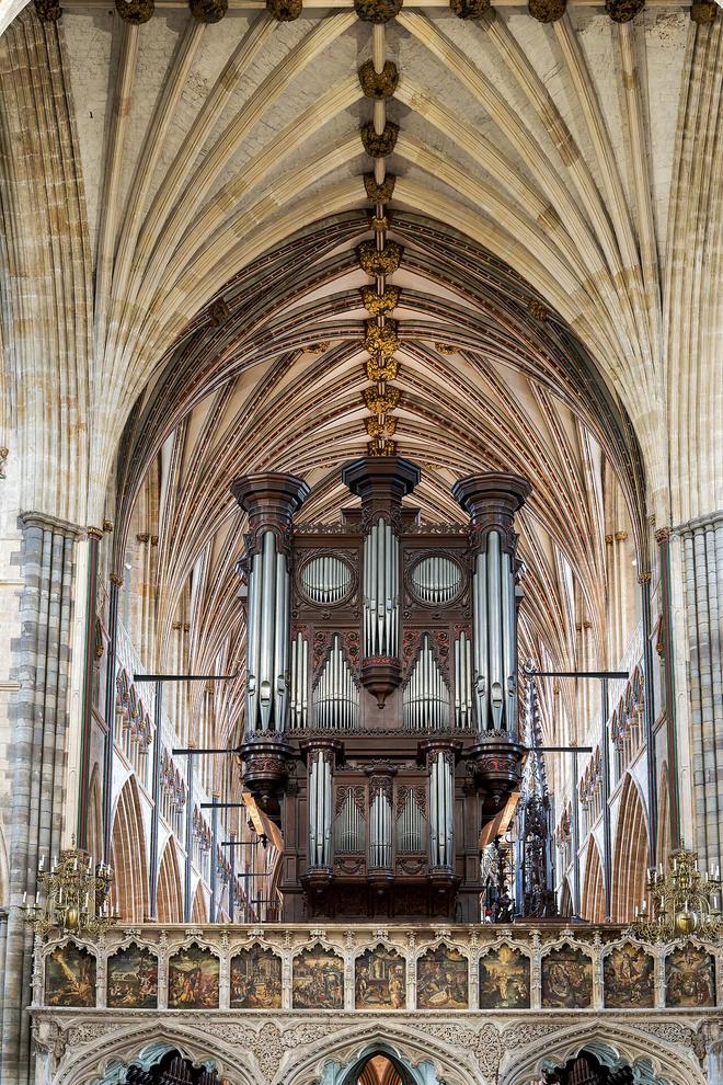 The stone pulpitum screen and organ at Exeter Cathedral beneath the vault