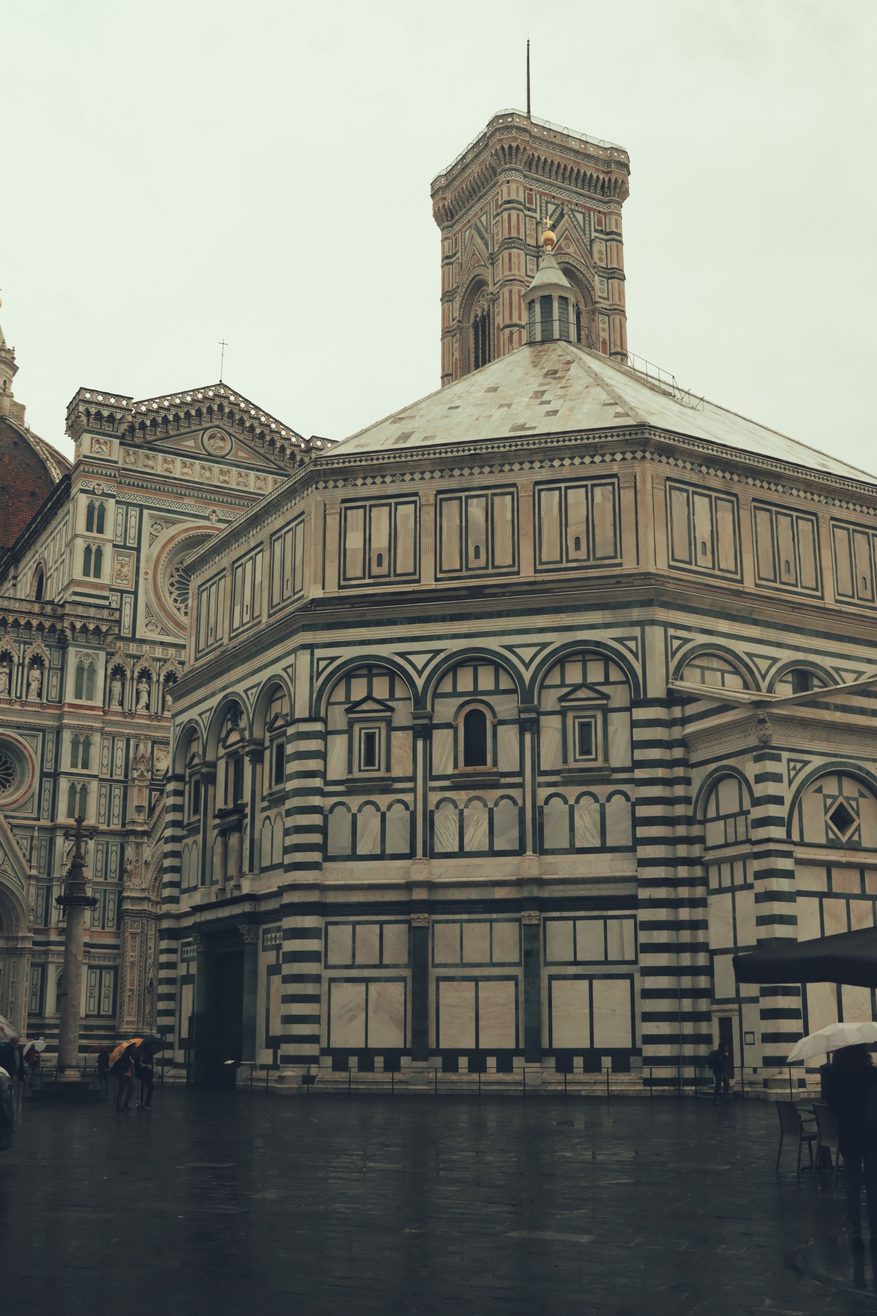 The octagonal Baptistery of San Giovanni in Florence, faced in green and white marble