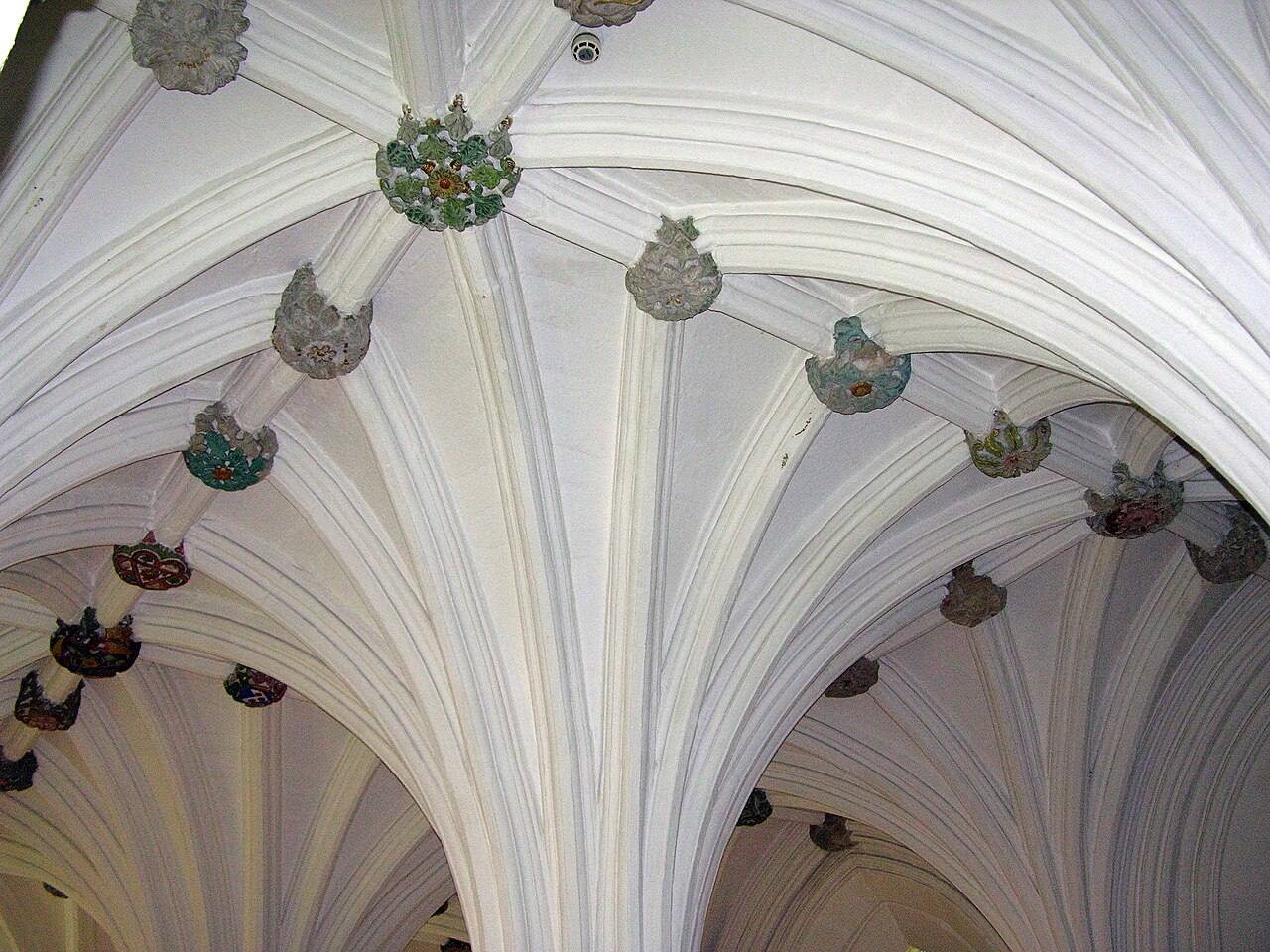The white-painted rib vault and bosses of the Blacader Aisle, Glasgow Cathedral