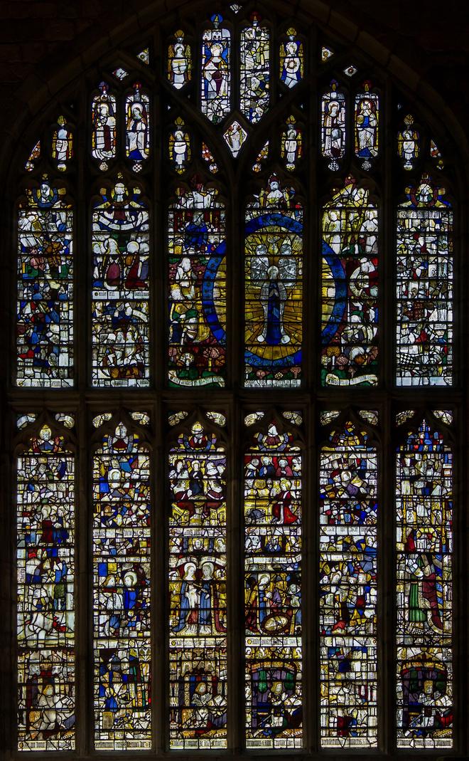 The tall Magnificat window in the north transept of Great Malvern Priory