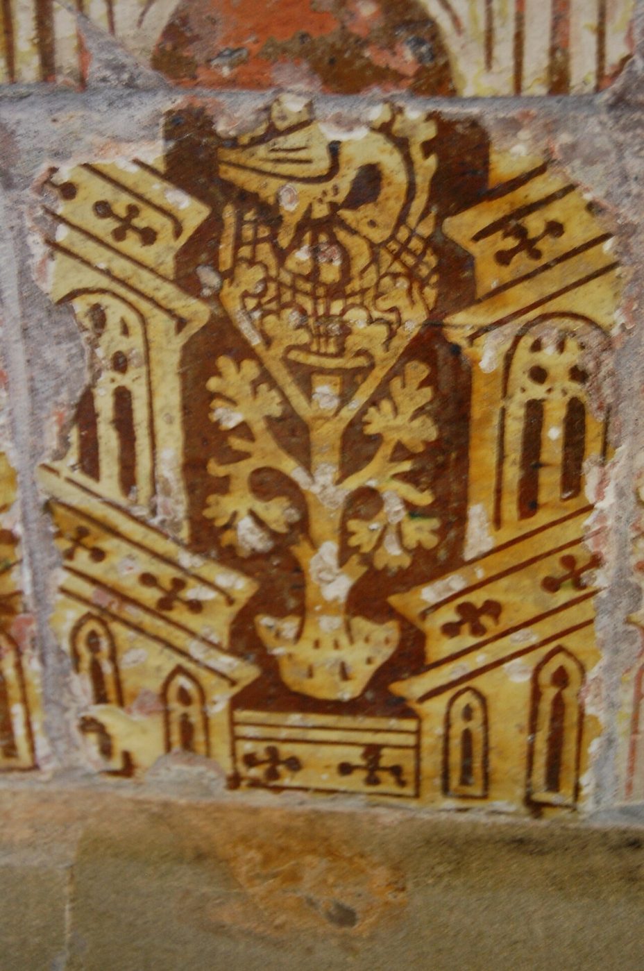 A medieval tile showing a pelican feeding its young with its own blood