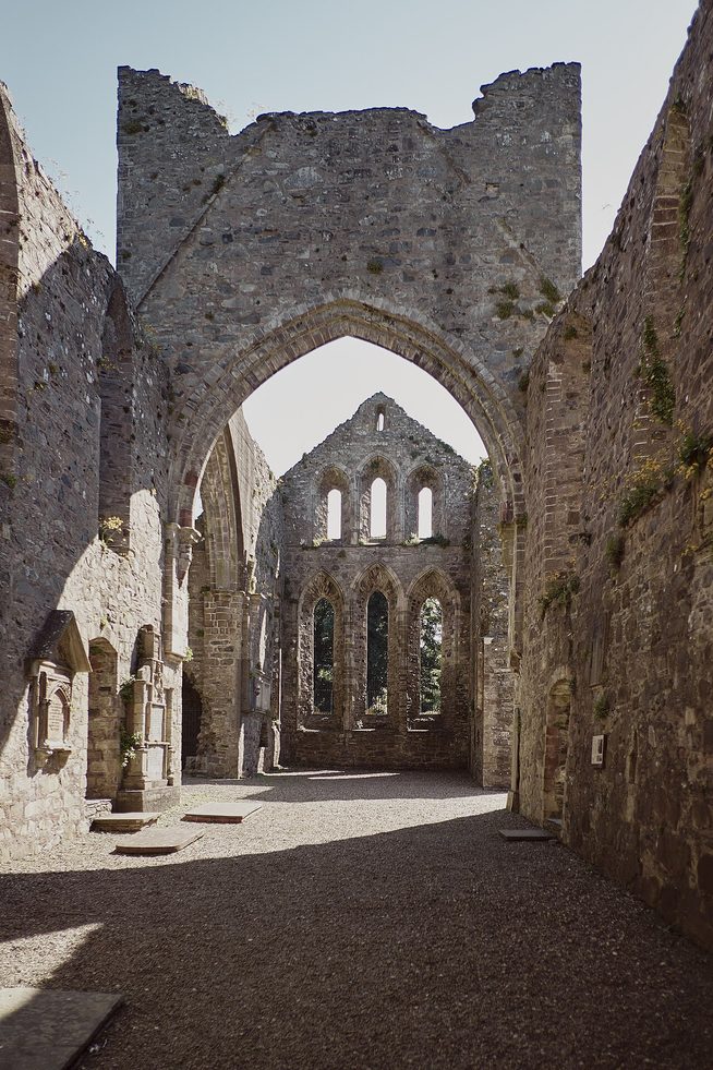The aisleless nave of Grey Abbey, roofless, looking along its walls