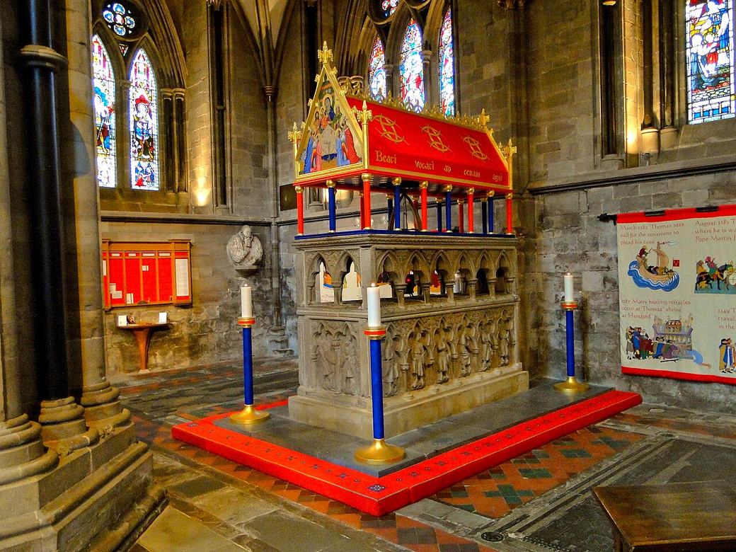 The shrine of St Thomas de Cantilupe at Hereford Cathedral with its red and gold painted canopy