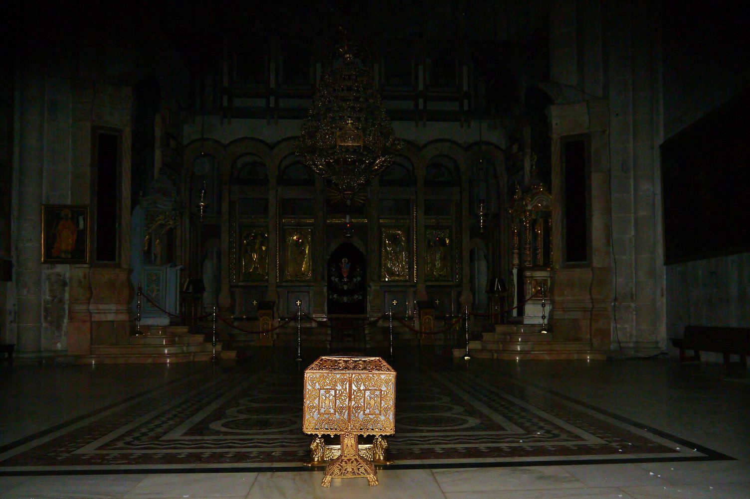 The Greek Orthodox Katholikon of the Church of the Holy Sepulchre, with its gilded iconostasis and dome