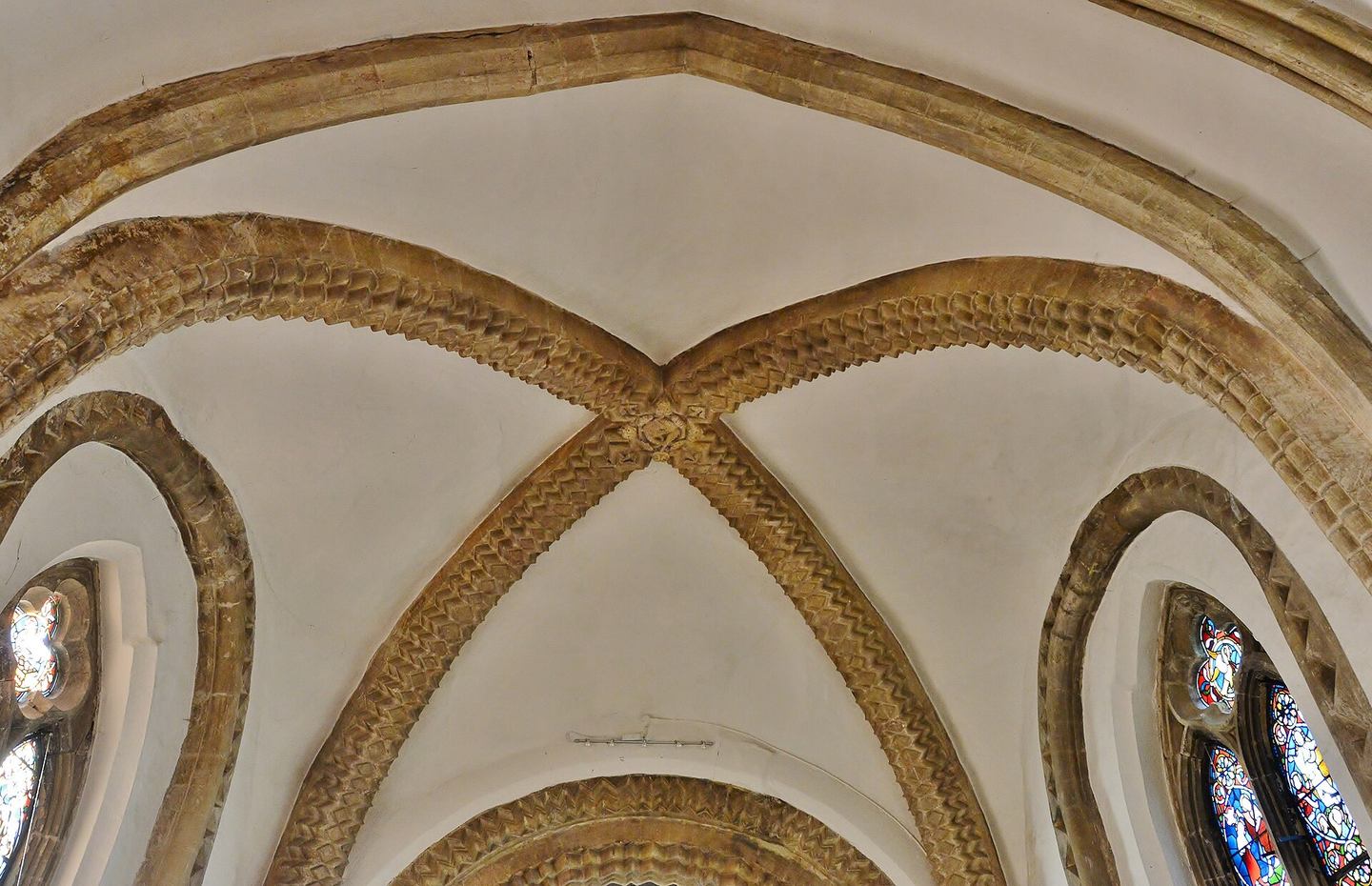 The carved Norman rib vault in the chancel of Iffley church
