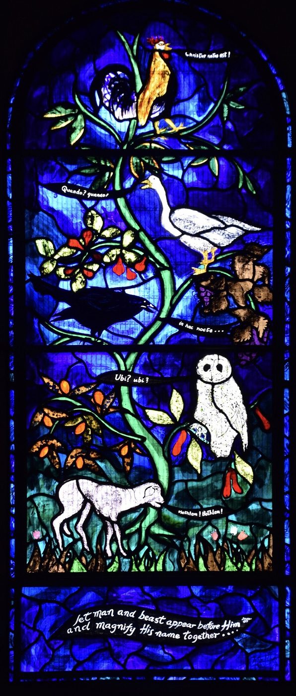 John Piper's Nativity window at Iffley, a tree of life in deep blue with birds and animals