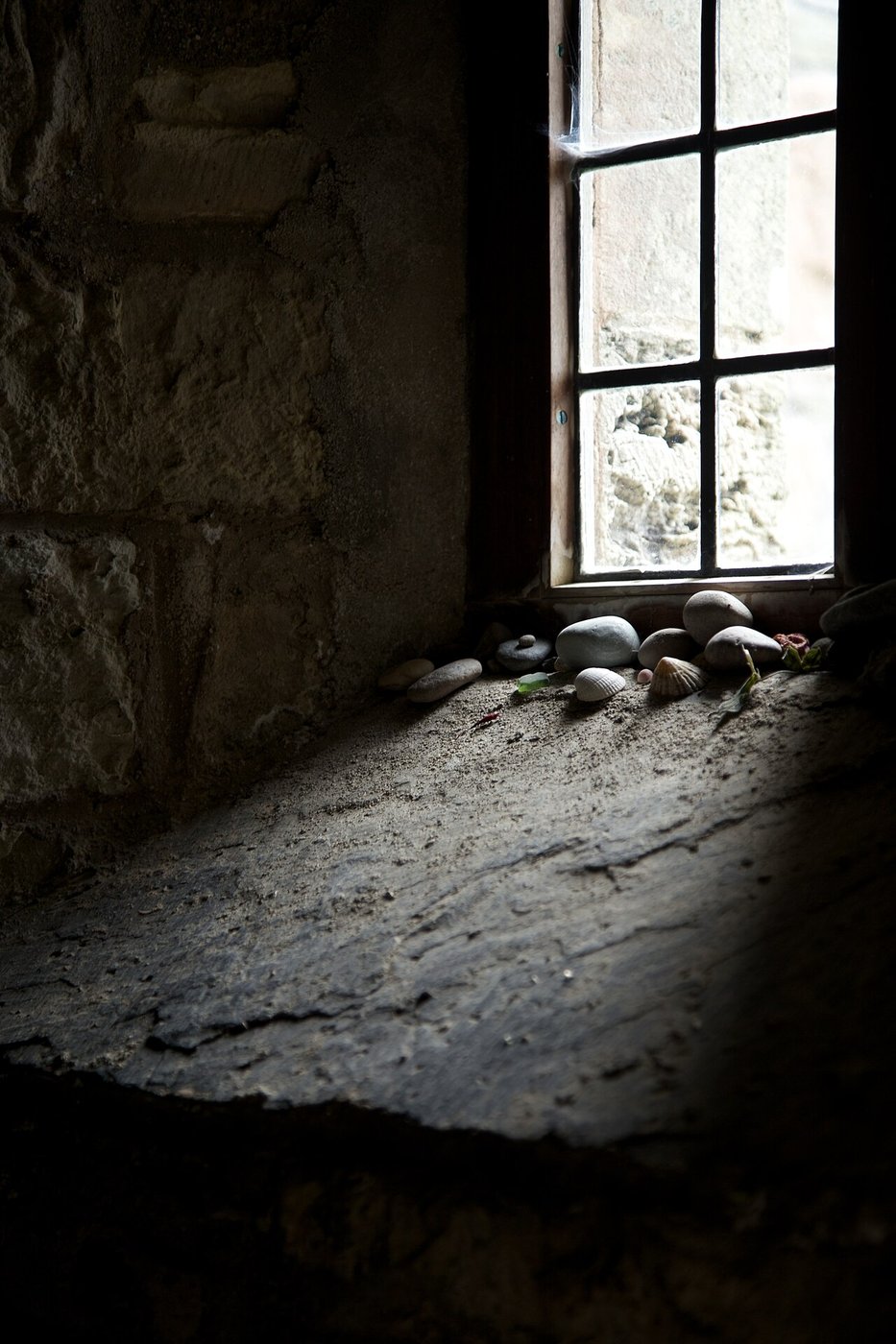 The dim interior of the small St Columba's Shrine at Iona Abbey