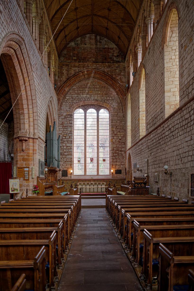 Inside the nave of Lanercost Priory church, with its arcade and tall clerestory