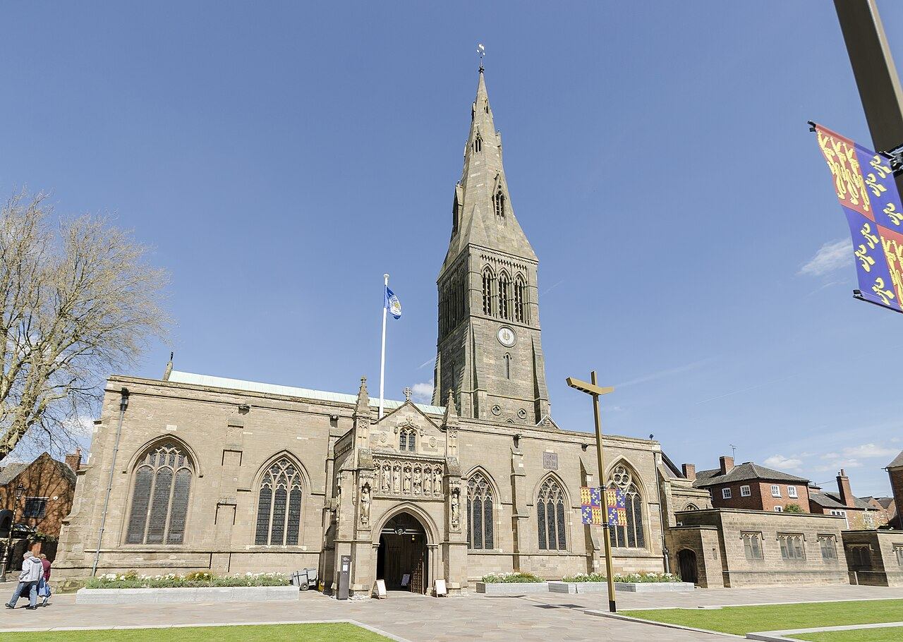 The south side of Leicester Cathedral and its spire, seen across a paved square